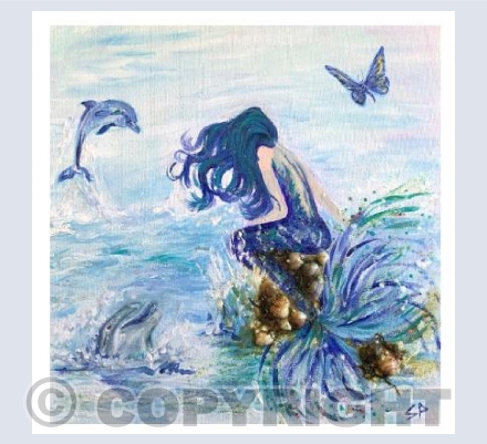 Mermaid On A Rock