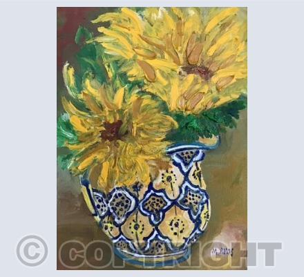 Sunflowers in a patterned jug
