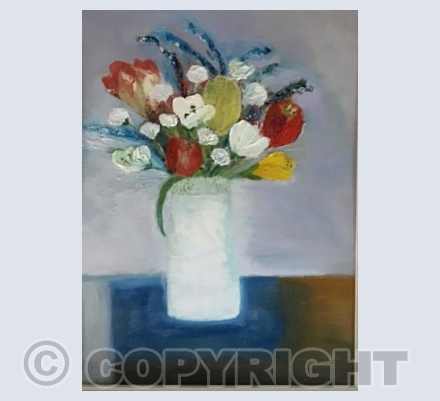 Spring flowers in white vase