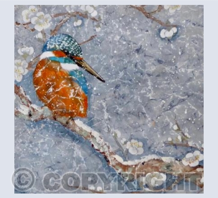 The kingfishers snowy perch